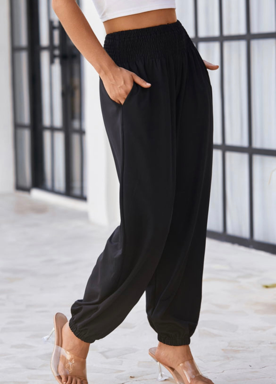 Black smocked high waisted joggers