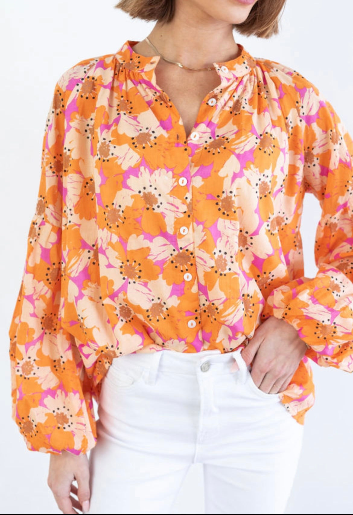 Orange floral blouse