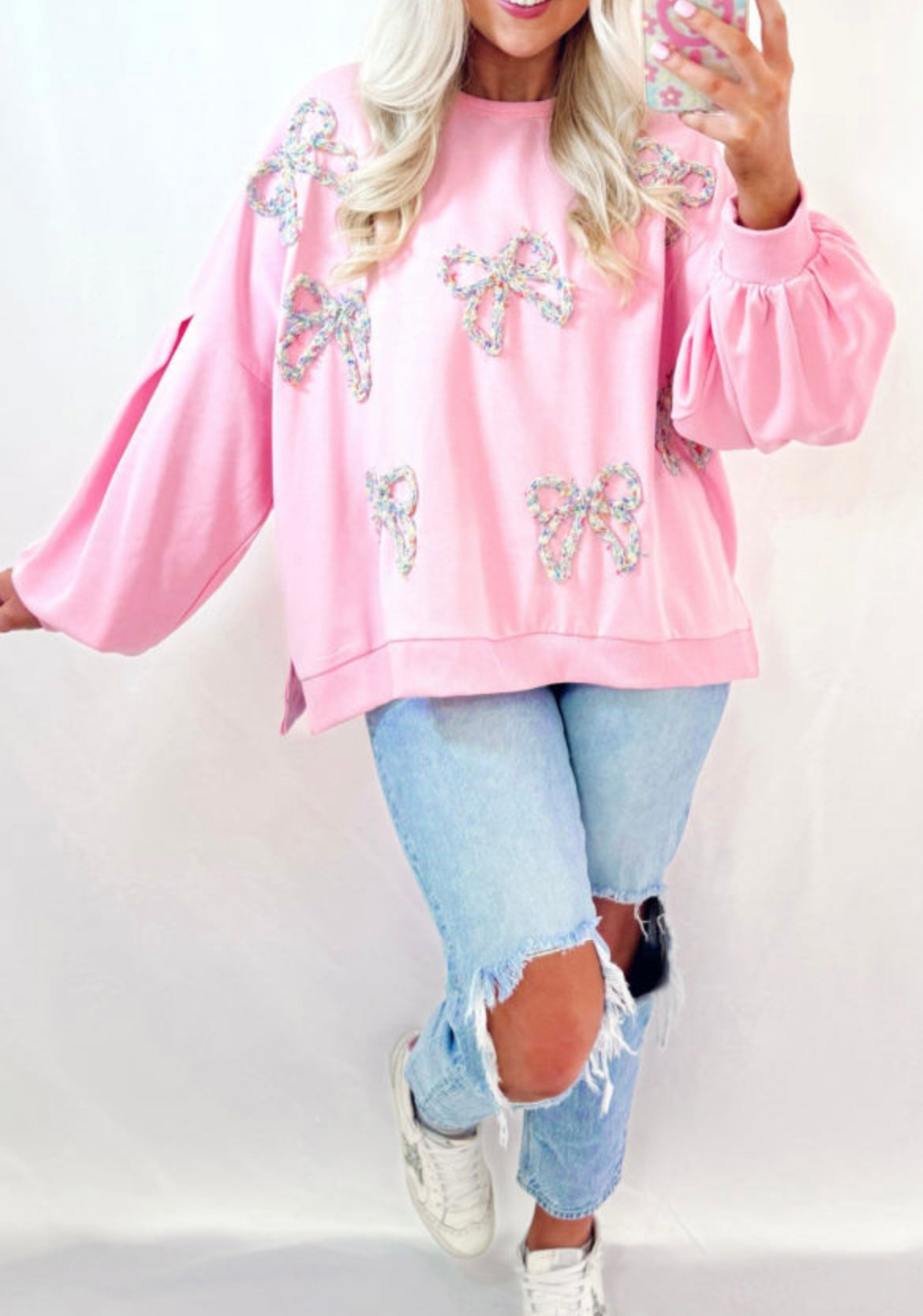 Oversized bow sweatshirt