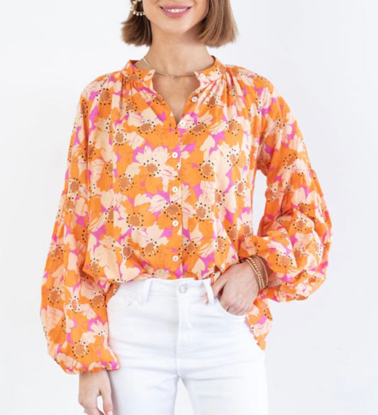 Orange floral blouse