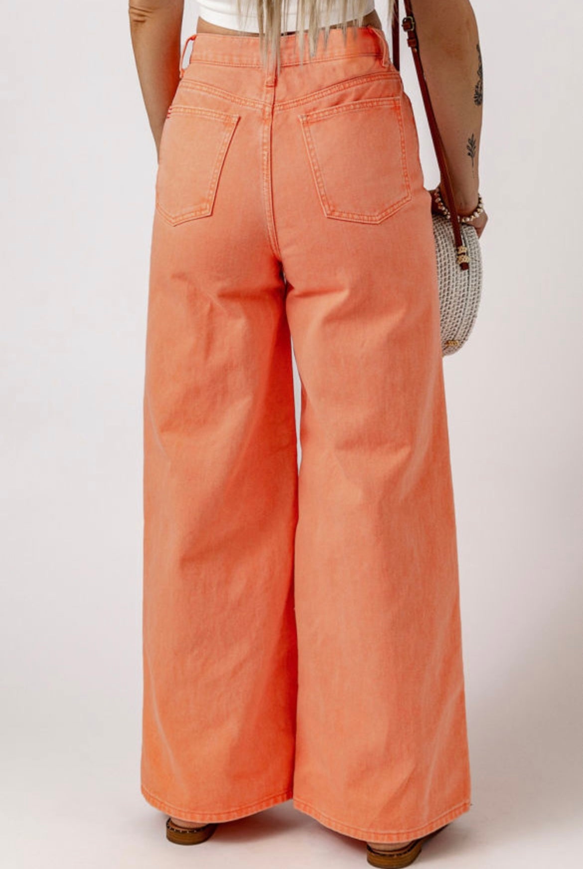 Orange acid wash high waisted jeans