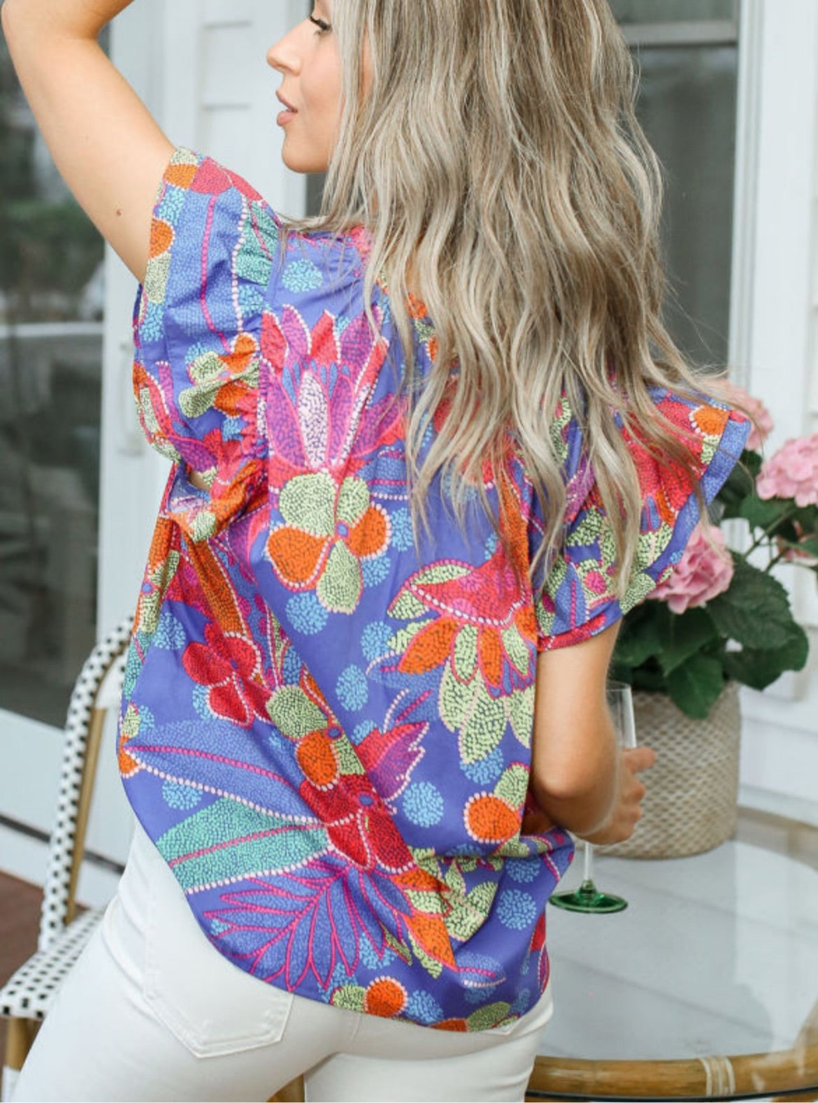 Blue floral flutter sleeve top